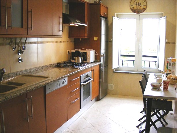 Fully equipped kitchen with breakfast area and storeroom