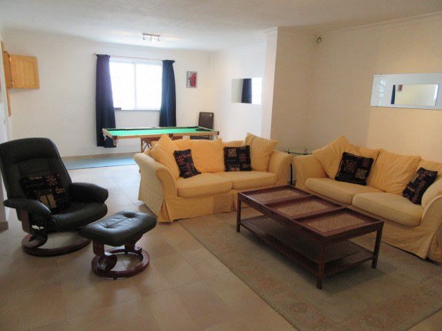 Games room with seating area, flat panel TV, DVD player, books and board games, darts and mini biljart