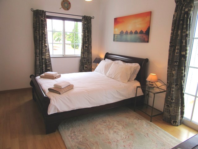 Spacious double bedroom with direct access to South East facing terrace