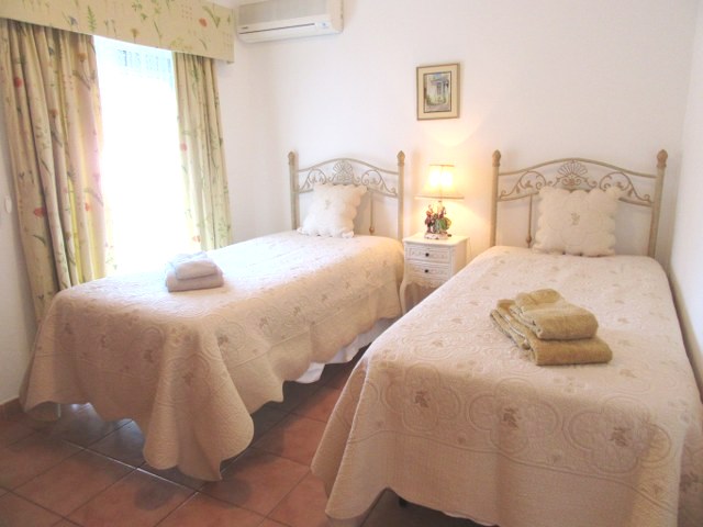 Good size double bedroom with twin beds, air conditioning and built in wardrobes